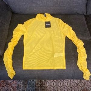 Sheer yellow long sleeve shirt